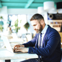 A Man Working On A Computer